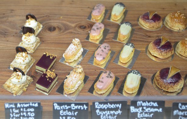 miniature eclairs for sale in a store 