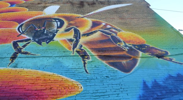 part of a mural, a large bee