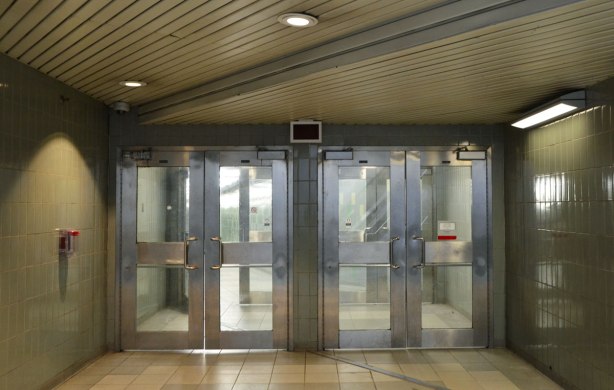 two sets of double doors, TTC subway station, metal doors with glass insets. 