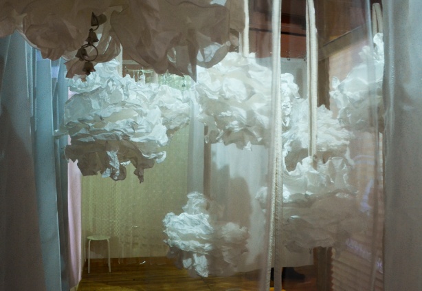 an art installation that looks like the puffy pieces in a car wash