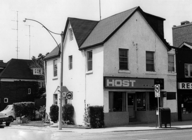 old black and white picture, 1981, of host rent a car shop at Imperial and Yonge, in Toronto, old two storey house