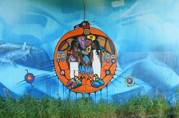 mural by Philip Cote, Kwest, and Jarus, Anishnaabe spirit world and underworld theme, a male and a female figure, holding hands