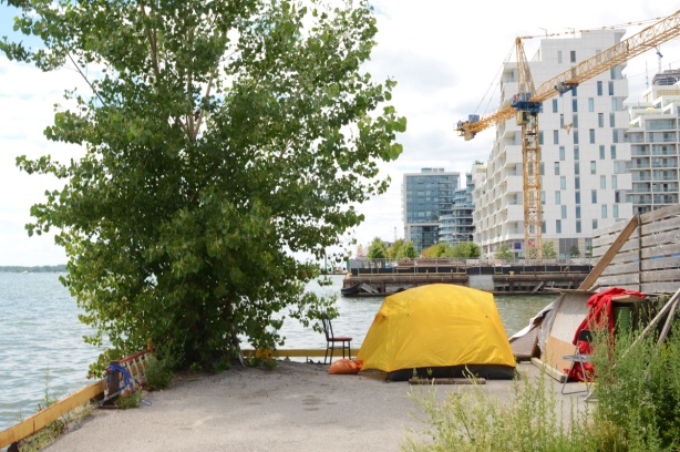 yellow tent along the waterfront