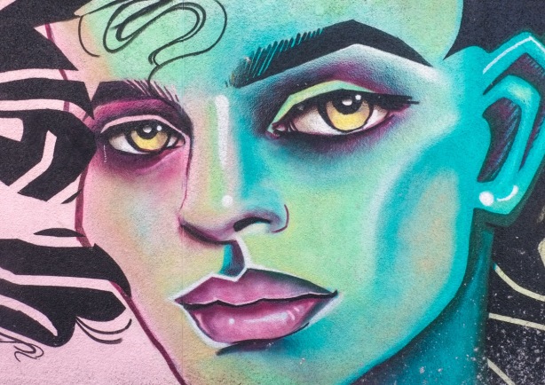 close up of face in woman portrait street art mural by anya mielniczek