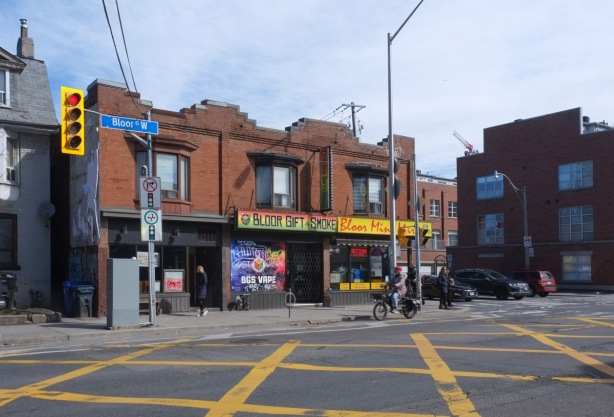 on Bloor West, at Sterling, old red brick building, with Bloor Gift and Smoke Shop