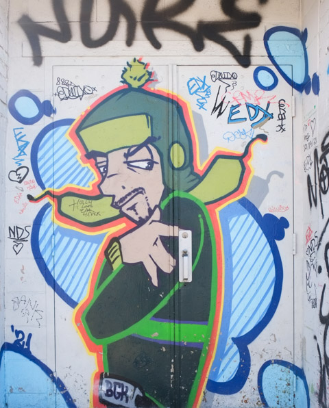 doorway mural, male character, in green clothing